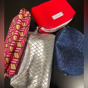 Bundle of 4 Make up/ cosmetic bag